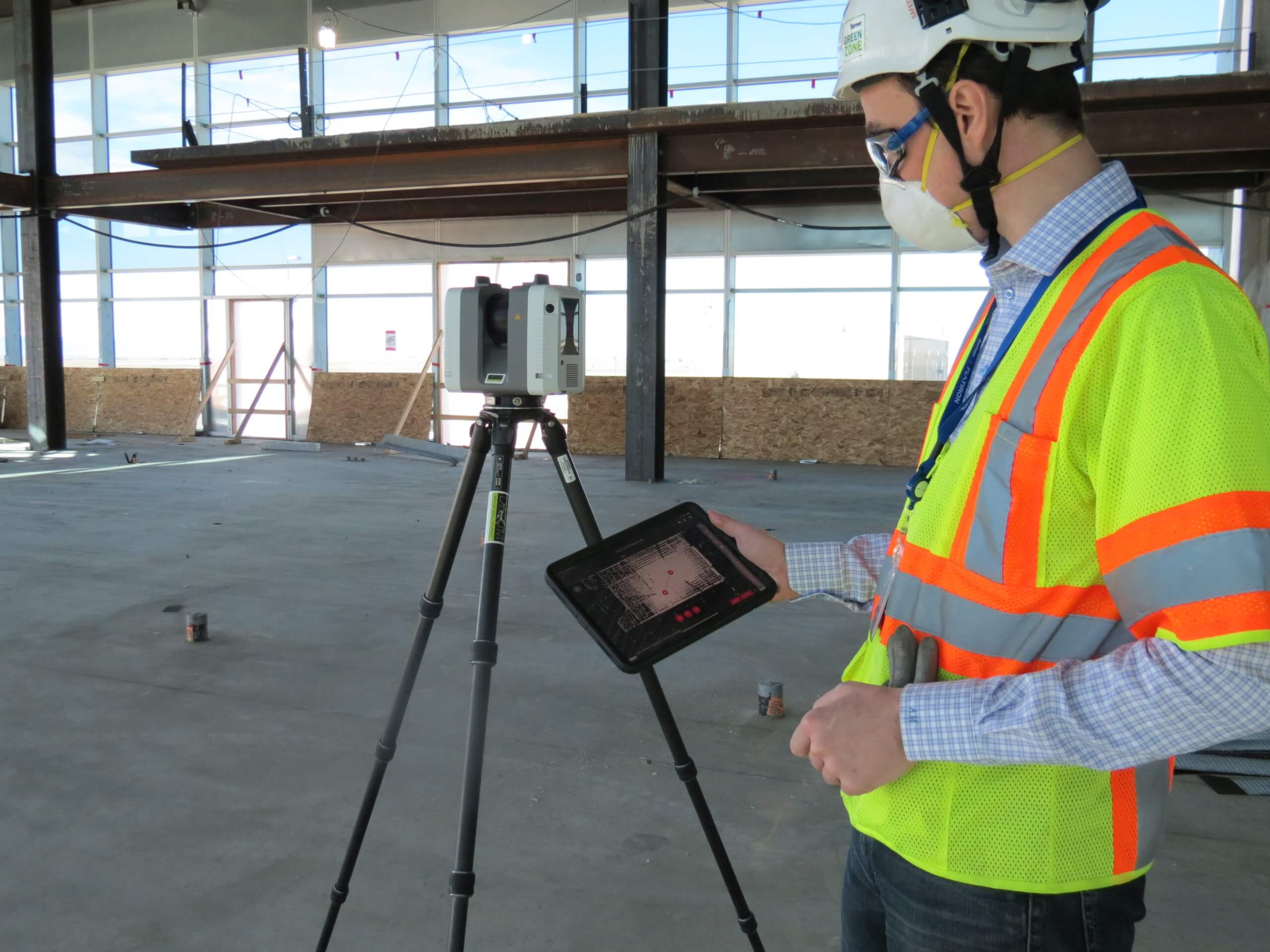 Adam Miller using laser scanner