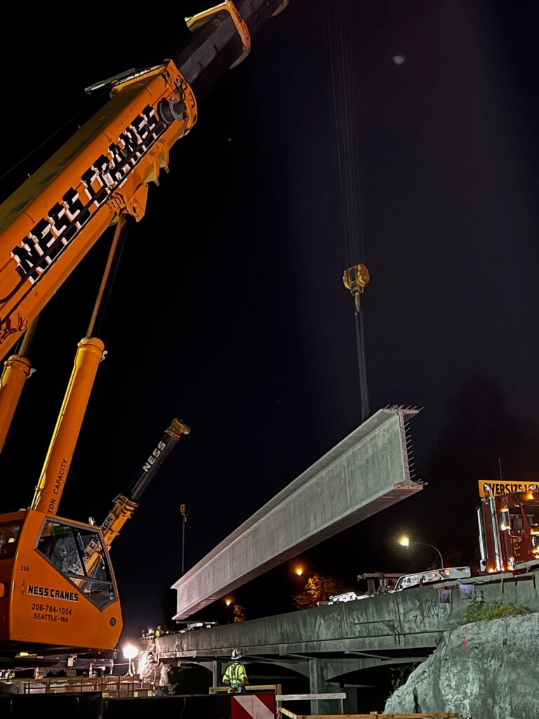 Night operations to place the first girders at May Creek